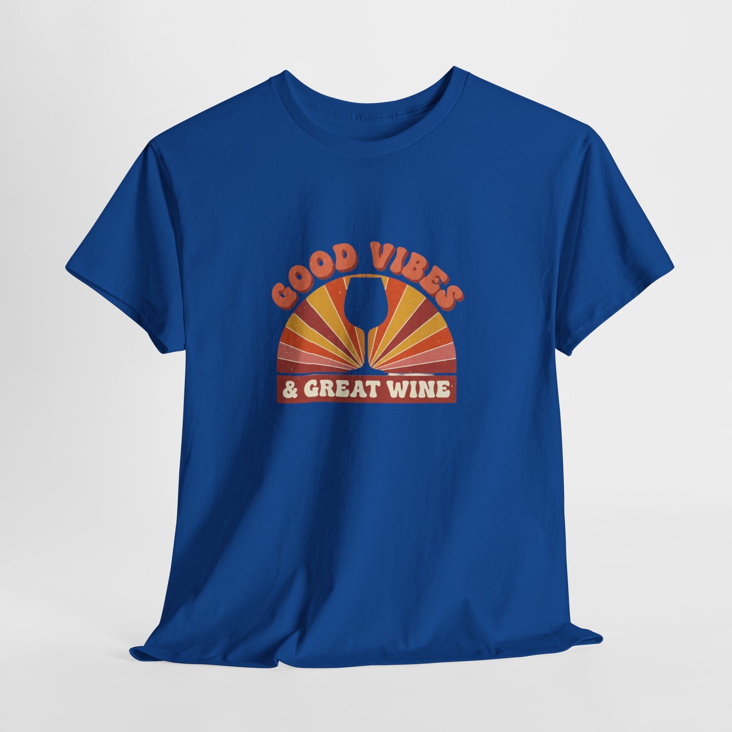 A blue T-shirt with a vintage graphic that states "good vibes and great wine" and white background
