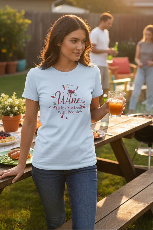 Women at a family bbq wearing a light blue t-shirt with red text that says "wine helps me deal with people"