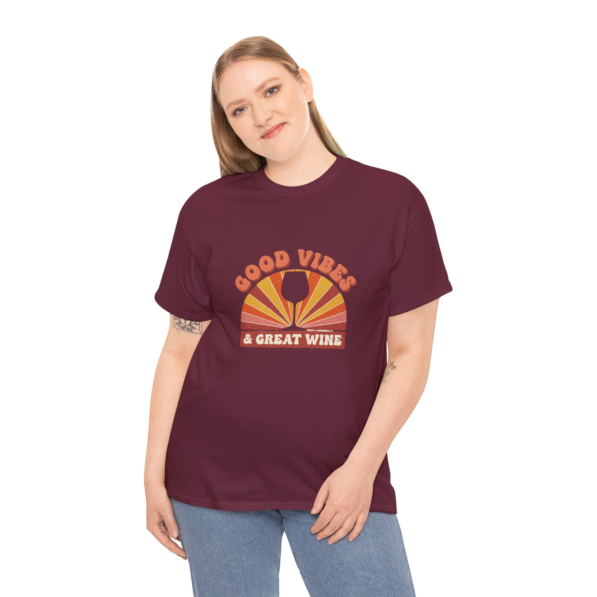 Person wearing a maroon t-shirt with 'Good Vibes & Great Wine' design on a white background