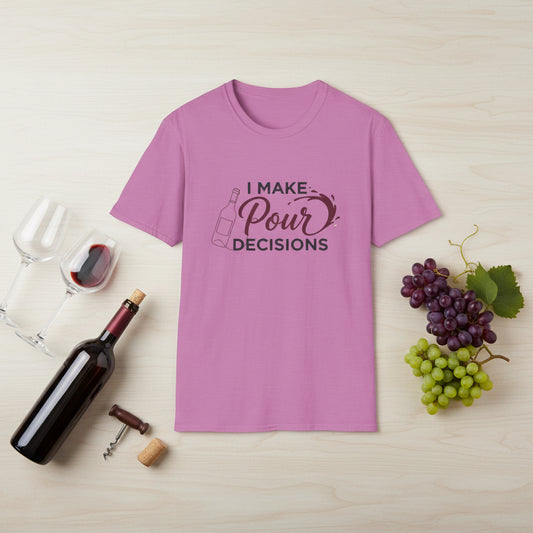 A pink color T-shirt that states "I make Pour Decisions" with a wine bottle graphic.